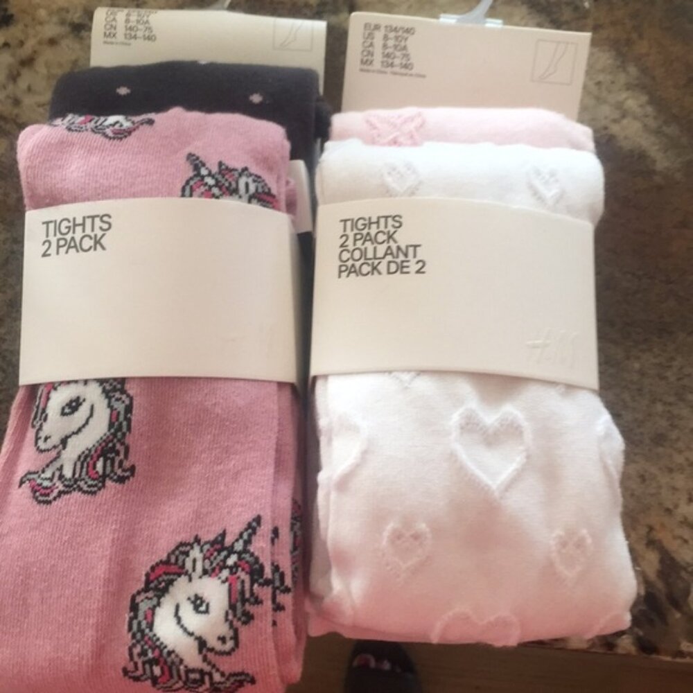 New girls 2 lots of 2 pack tights. Total 4 pairs